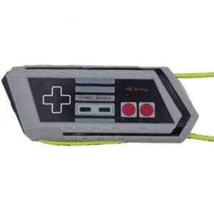 Here's an alt tag for the image: NES controller keychain.