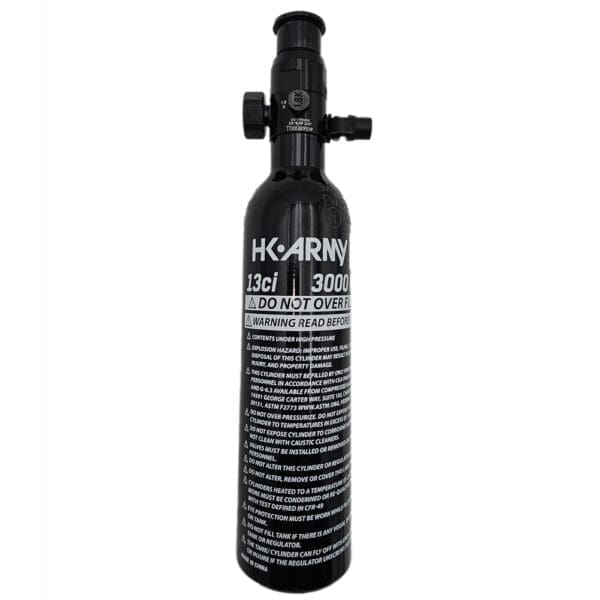 Compressed air tank with warning labels.