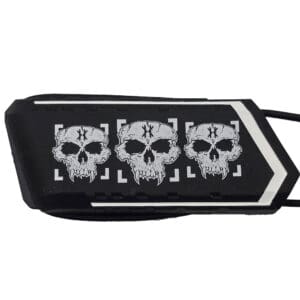 Black object with three white skulls design.