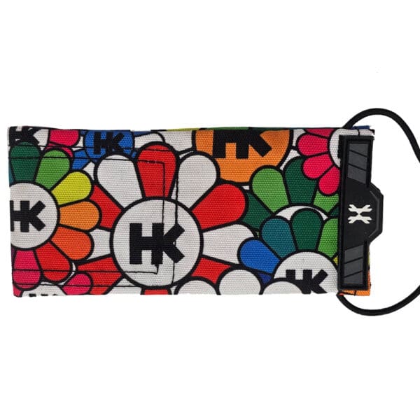Colorful floral-patterned wallet with black strap.
