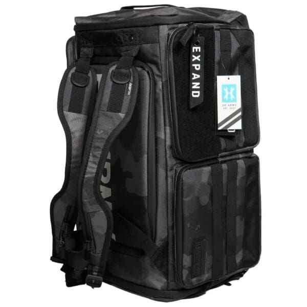 Black expandable camo backpack with multiple compartments.