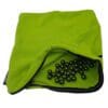Green bag with scattered dark beads inside.