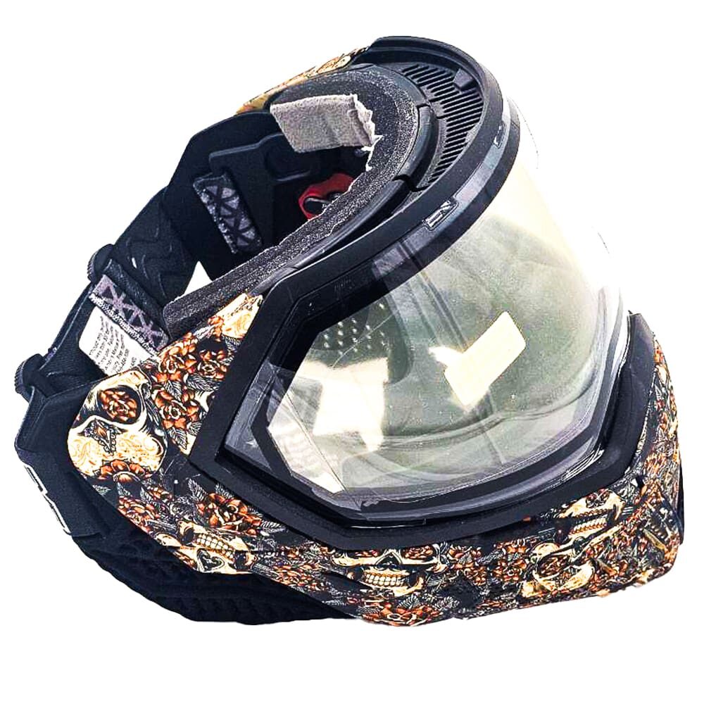 Black and gold skull paintball mask.